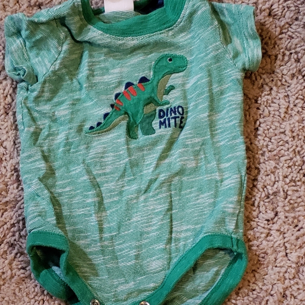 green with dinosaur appliqué onesie